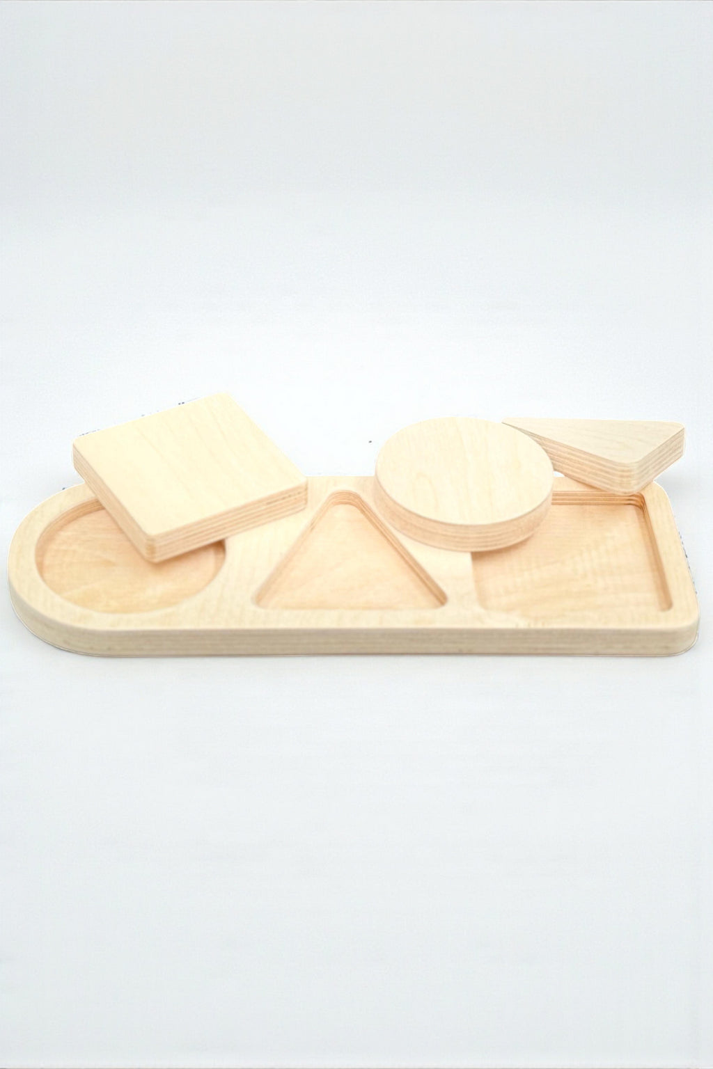 3 Piece Geometry Wooden Puzzle Toy | Hands-On Shape Board for Toddlers | Natural Wood Activity Toy - side view showing the slim profile