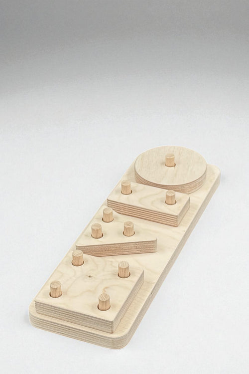 4-Piece Wooden Geometry Puzzle Board | Montessori-Style Shape Toy for Kids - close up of the wooden puzzle design