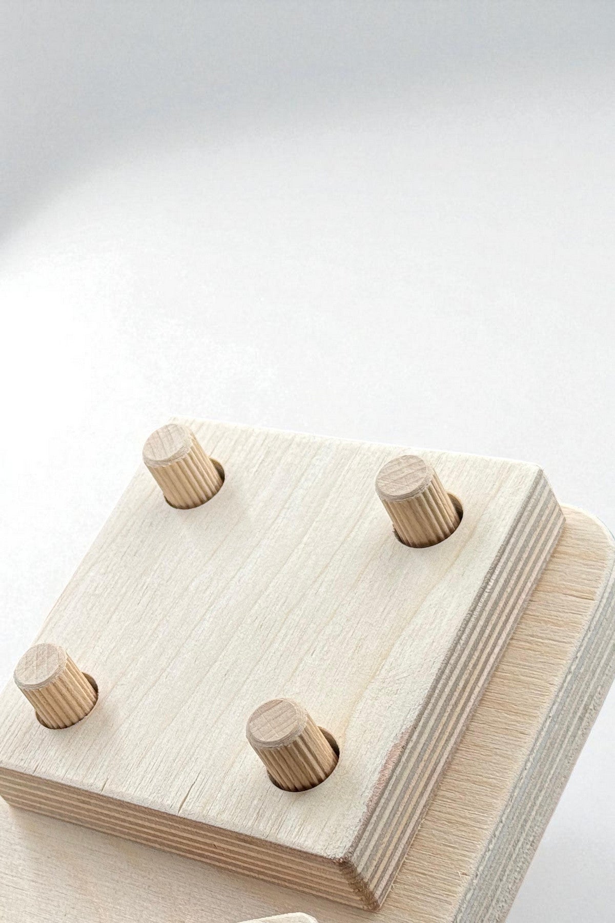 4-Piece Wooden Geometry Puzzle Board | Montessori-Style Shape Toy for Kids - front view of the wooden activity toy