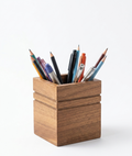 Square Wooden Pencil Holder with Striped Design, Brown MDF Desk Organizer, Minimal Table Storage for Pens and Pencils - close up of the product detail