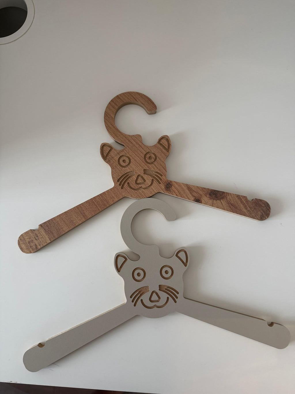 Set of 6 Brown Wooden Kids Coat Hangers, Child-Size Clothes Hangers for Nursery and Closet Organization - close up of the product detail