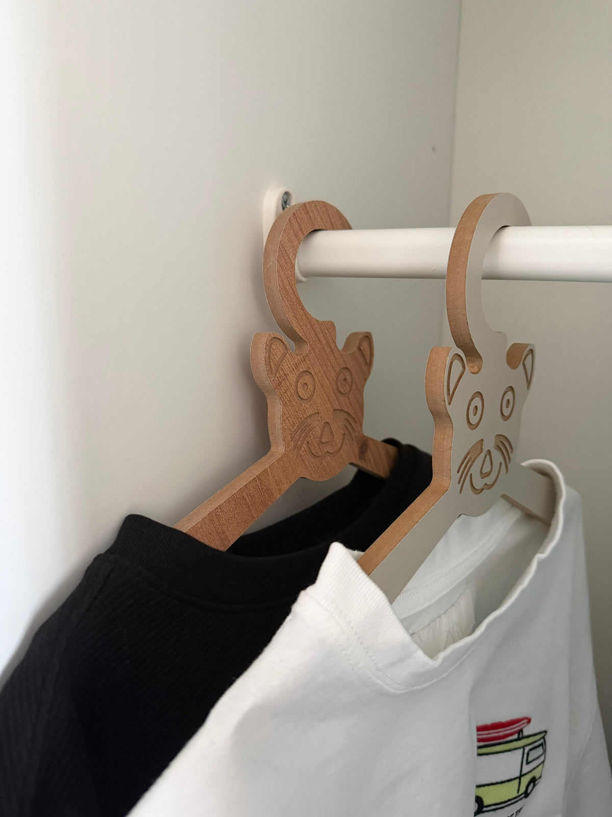 Set of 6 Brown Wooden Kids Coat Hangers, Child-Size Clothes Hangers for Nursery and Closet Organization - side view showing the product profile