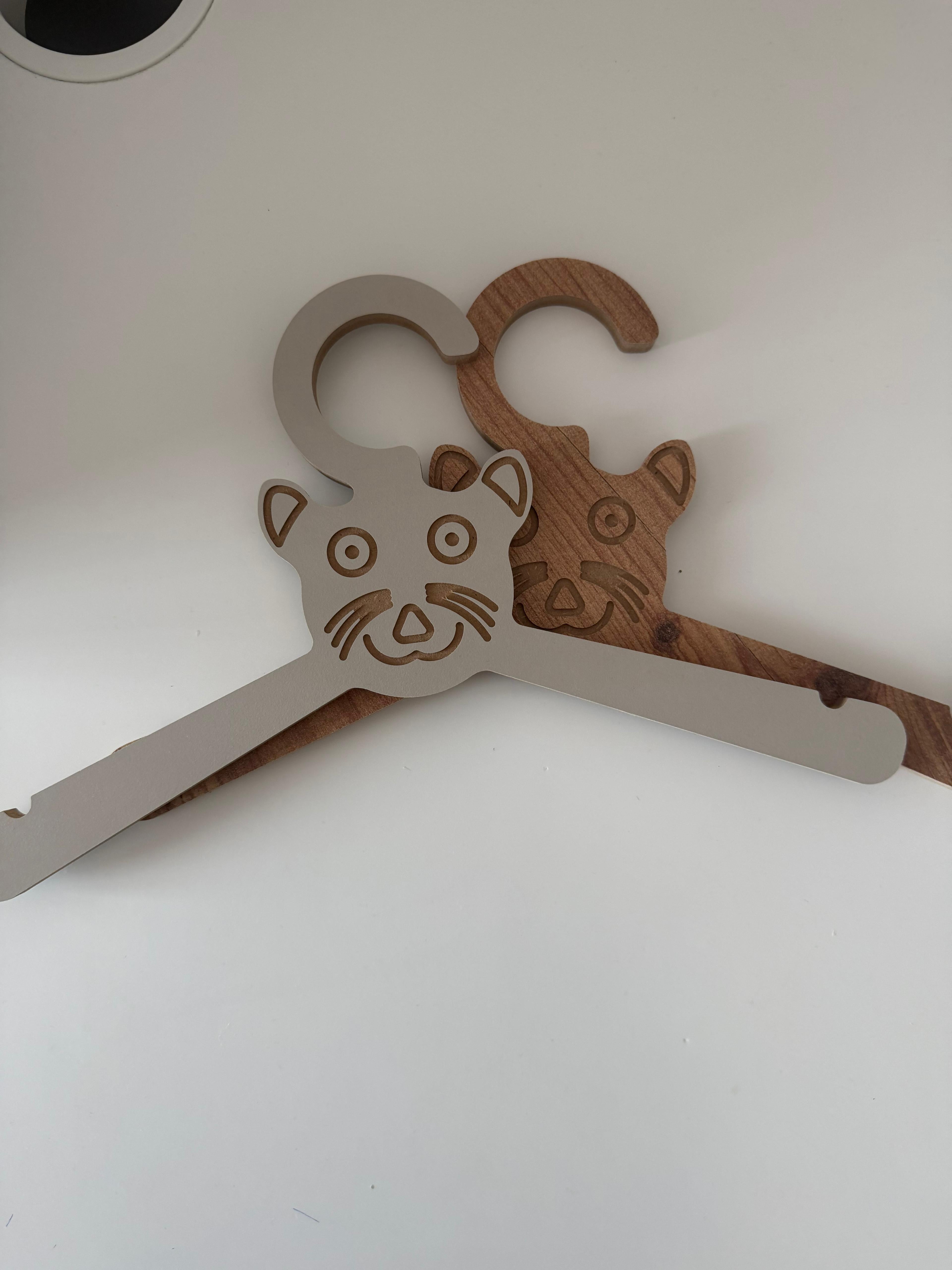 Set of 6 Brown Wooden Kids Coat Hangers, Child-Size Clothes Hangers for Nursery and Closet Organization - styled use and display idea